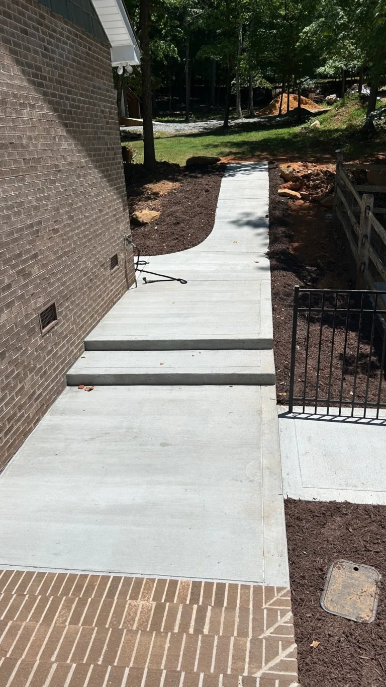 Concrete walkway at a lake house